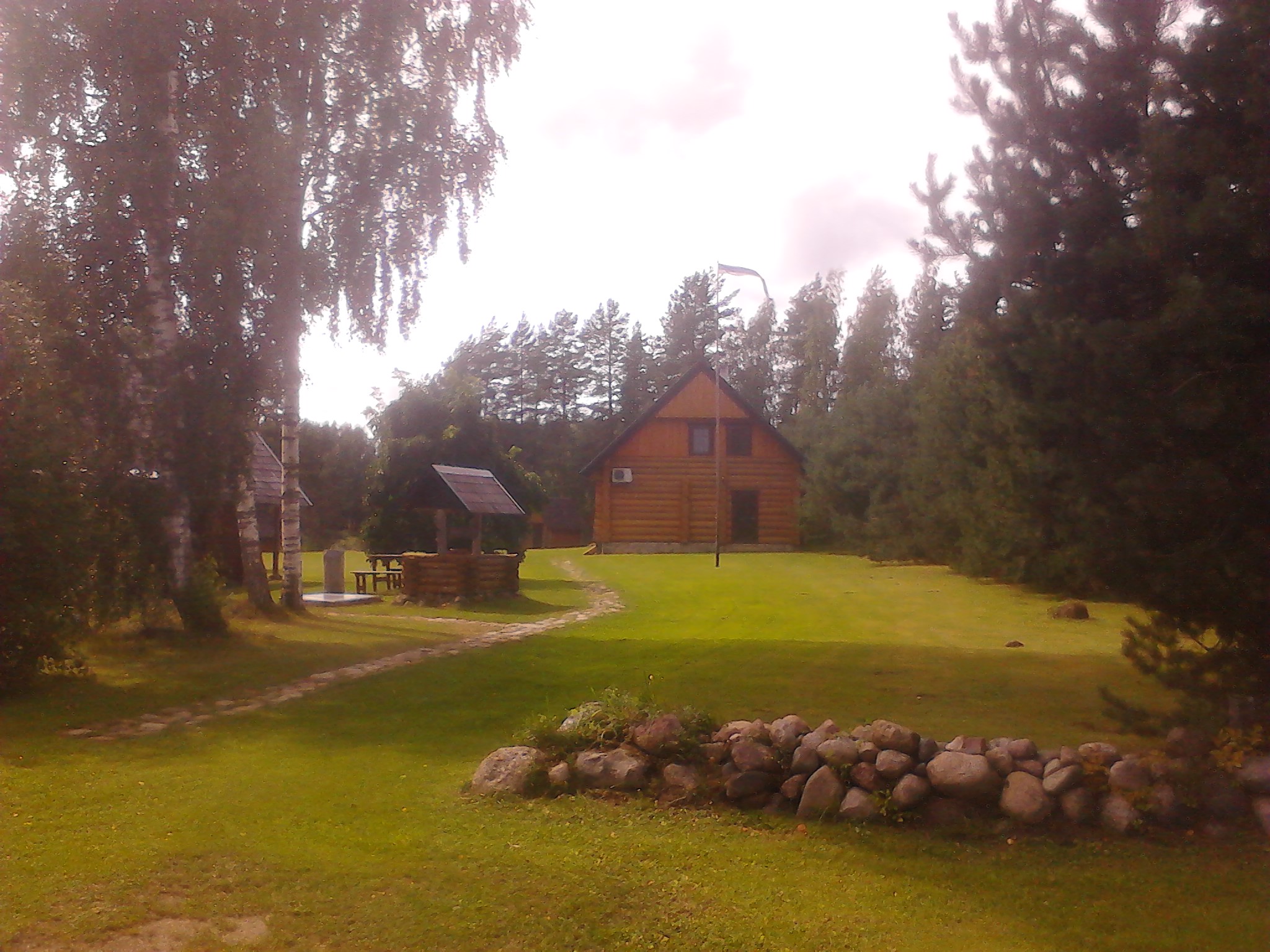 Old country-side house with a big grass yard